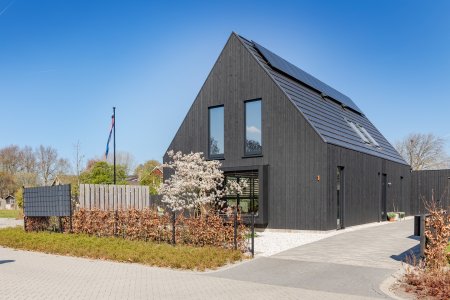 Schuurwoning met gevelbekleding